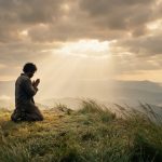 Person_praying_on_hill_202608101044