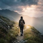 Person_walking_on_mountain_path_202608231215